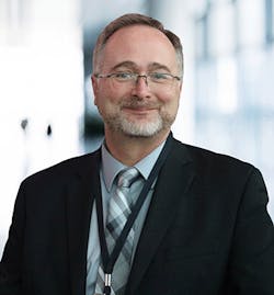 Headshot-of-Charlie-Norz Headshot-of-Charlie-Norz