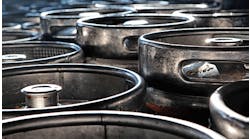 dirty-kegs-lined-grouped-together dirty-kegs-lined-grouped-together
