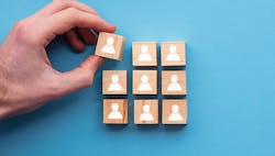 1663606626401 Handplacingfinalblockin3by3squaremadeofwoodblockswithiconsofpeople 1663606626401 Handplacingfinalblockin3by3squaremadeofwoodblockswithiconsofpeople