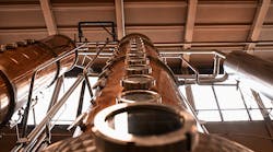 Image of copper distillation columns for alcohol distillation
