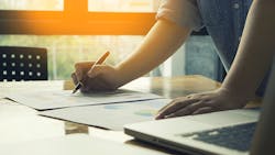 Person developing business plan Person developing business plan