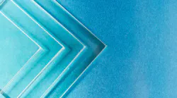 four pieces of square glass on a blue background