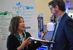 “We have been in the energy industry for the longest time. This is not a new focus for us.” Emerson’s Susan Ooi took author Chris McNamara on a tour of the company’s new sustainability focused booth at Emerson Exchange. “We have been in the energy industry for the longest time. This is not a new focus for us.” Emerson’s Susan Ooi took author Chris McNamara on a tour of the company’s new sustainability focused booth at Emerson Exchange.