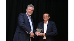 Wright Sullivan (l.), president of A&amp;E Engineering Inc., and emcee of the 2023 CSIA awards dinner, presents the Charlie Bergman &ldquo;Remember Me&rdquo; award to Andrew Downs (r.), founder and executive director of Sage Group.