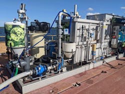 A look at the Hydronucleation Flotation Technology (HFT) harvester set up on a barge