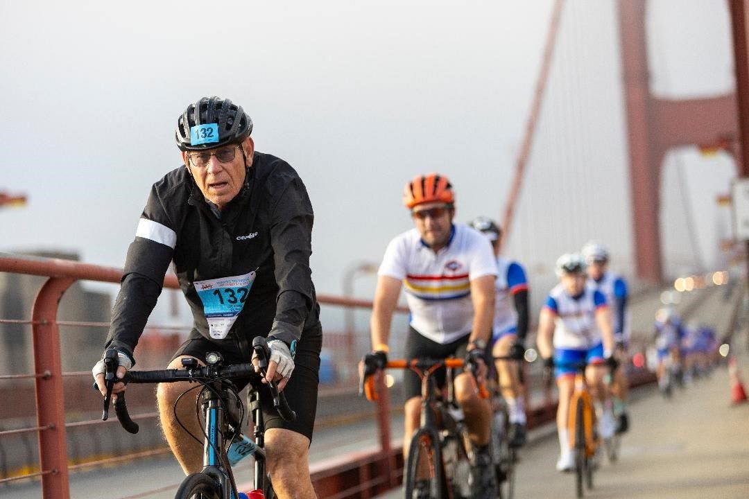 Weiss biking over the Golden Gate Bridge, part of the 75 mile Multiple Sclerosis-MS Society Waves to Wine fundraiser