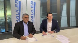 Boris Gabin (left), VP for Australia and New Zealand at Emerson, signs an agreement with Tyson Cooney (right), CEO of H2 Hauler, to provide integrated hydrogen mobility technologies. Boris Gabin (left), VP for Australia and New Zealand at Emerson, signs an agreement with Tyson Cooney (right), CEO of H2 Hauler, to provide integrated hydrogen mobility technologies.