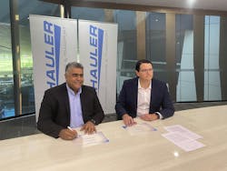 Boris Gabin (left), VP for Australia and New Zealand at Emerson, signs an agreement with Tyson Cooney (right), CEO of H2 Hauler, to provide integrated hydrogen mobility technologies. Boris Gabin (left), VP for Australia and New Zealand at Emerson, signs an agreement with Tyson Cooney (right), CEO of H2 Hauler, to provide integrated hydrogen mobility technologies.