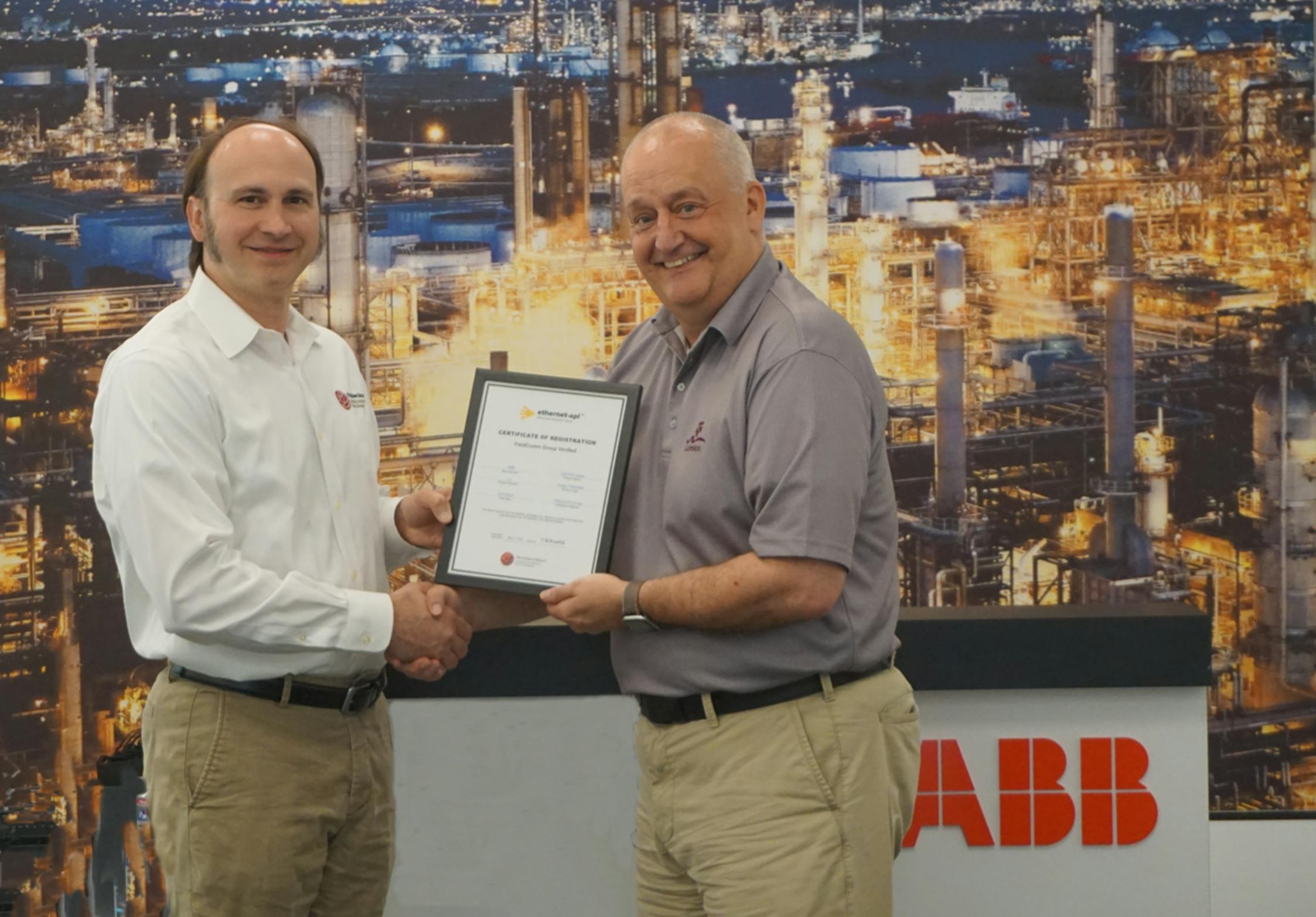 Sean Vincent, technology program director at FieldComm Group (left), and Peter Bradley, measurement and analytics global marketing and sales manager at ABB USA, celebrate the certification of ABB&rsquo;s VortexMaster FSV400 and SwirlMaster FSS400 flowmeters as complying with Ethernet-APL&rsquo;s requirements for Ethernet and TCP/IP connectivity in hazardous environments.