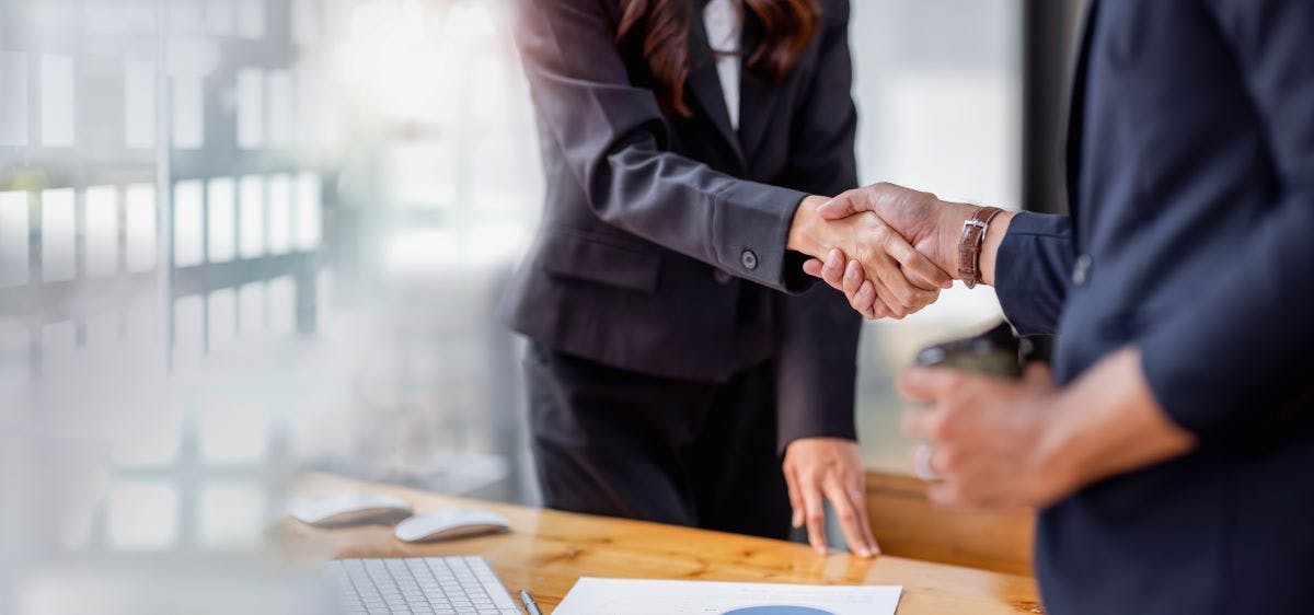 Business handshake for teamwork of business acquisition