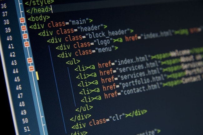 Metadata in code editor for website development, implementing SEO concepts for better SERP