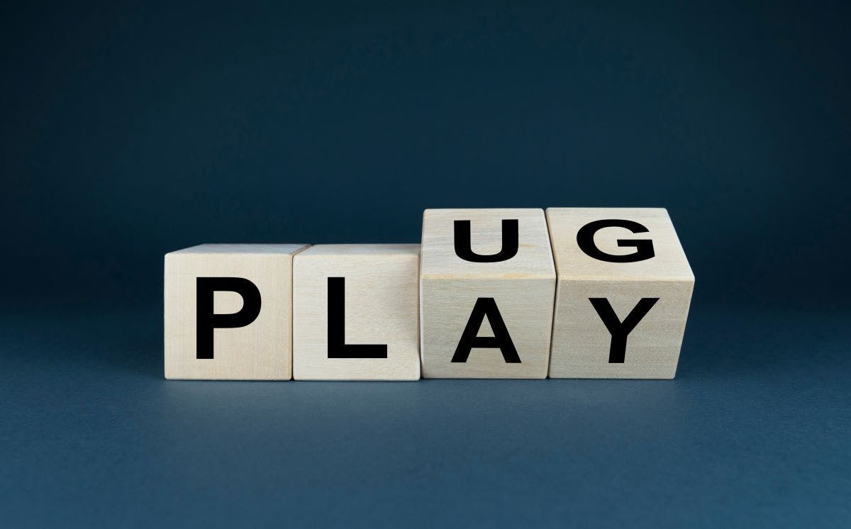 Plug and Play. The cubes form a plug and play expression. Technology concept
