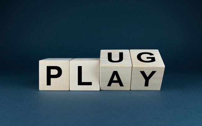 Plug and Play. The cubes form a plug and play expression. Technology concept
