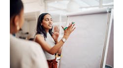 Woman, mentor and whiteboard in office for training, teaching and learning for skill or career development Woman, mentor and whiteboard in office for training, teaching and learning for skill or career development