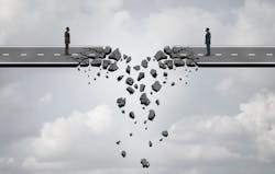 two businessmen on a road bridge that is breaking down and disconnecting two businessmen on a road bridge that is breaking down and disconnecting