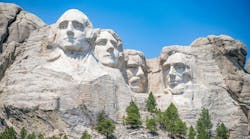 Mount Rushmore in the Black Hills of South Dakota against a clear sky. Mount Rushmore in the Black Hills of South Dakota against a clear sky.