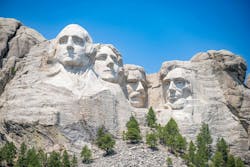 Mount Rushmore in the Black Hills of South Dakota against a clear sky. Mount Rushmore in the Black Hills of South Dakota against a clear sky.