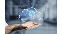 Close up of business man hand holding abstract glowing cloud hologram with globe and safety icons, polygonal mesh on blurry interior background Close up of business man hand holding abstract glowing cloud hologram with globe and safety icons, polygonal mesh on blurry interior background