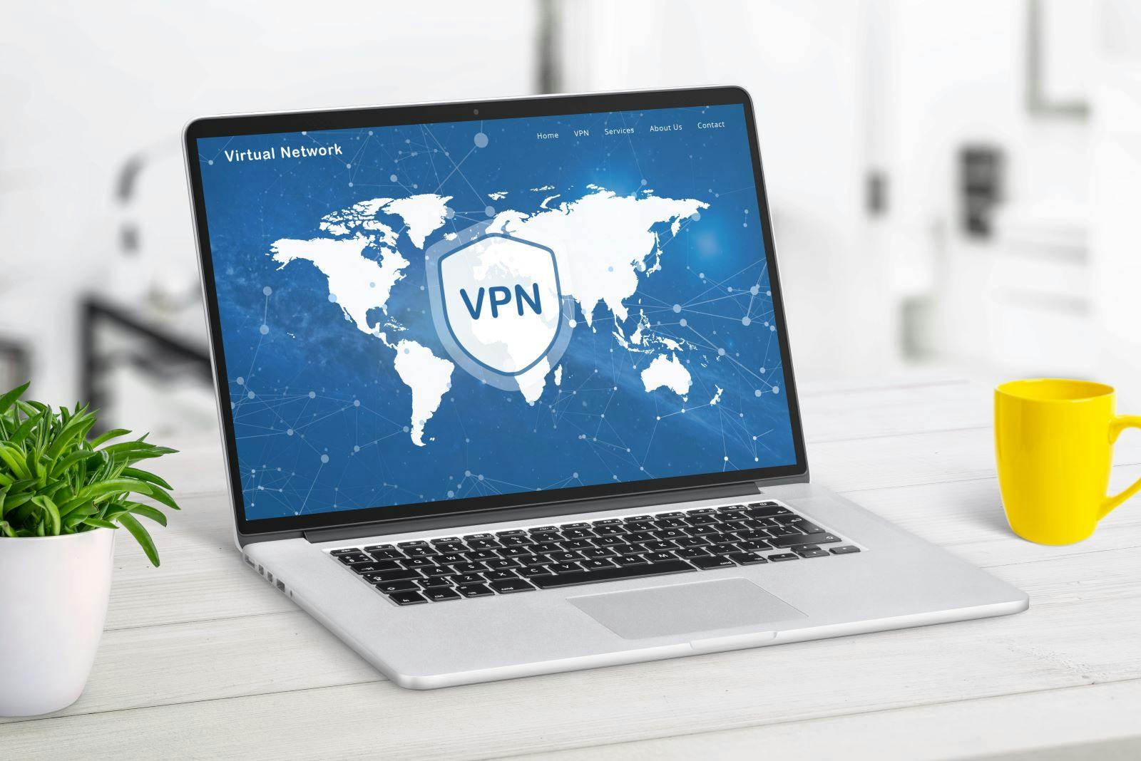 VPN web page service on laptop display displaying a world map with VPN locations. Highlights global network access, online security, and privacy protection