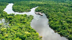 Aerial view of Amazon rainforest in Peru, South America. Green forest. Bird's-eye view. Jungle in Peru. Aerial view of Amazon rainforest in Peru, South America. Green forest. Bird's-eye view. Jungle in Peru.
