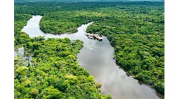 Aerial view of Amazon rainforest in Peru, South America. Green forest. Bird's-eye view. Jungle in Peru. Aerial view of Amazon rainforest in Peru, South America. Green forest. Bird's-eye view. Jungle in Peru.
