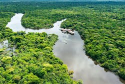 Aerial view of Amazon rainforest in Peru, South America. Green forest. Bird's-eye view. Jungle in Peru. Aerial view of Amazon rainforest in Peru, South America. Green forest. Bird's-eye view. Jungle in Peru.