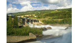 Hunderfossen dam in the Lagen river close to the Norwegian town Lillehammer Hunderfossen dam in the Lagen river close to the Norwegian town Lillehammer