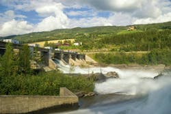 Hunderfossen dam in the Lagen river close to the Norwegian town Lillehammer Hunderfossen dam in the Lagen river close to the Norwegian town Lillehammer