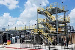 Figure 1: The 32-ft, propylene glycol distillation and recycling unit at LyondellBasell’s Center for Petrochemical Energy & Technology (CPET) at San Jacinto College in Pasadena, Texas, includes an eight tray column, DeltaV DCS, cooling water, boiler and reverse osmosis utilities, and 72 I/O with smart Rosemount transmitters. CPET’s glass pilot plant has two tank farms, feeding four process units, and all-glass and -acrylic components for easier observation. Figure 1: The 32-ft, propylene glycol distillation and recycling unit at LyondellBasell’s Center for Petrochemical Energy & Technology (CPET) at San Jacinto College in Pasadena, Texas, includes an eight tray column, DeltaV DCS, cooling water, boiler and reverse osmosis utilities, and 72 I/O with smart Rosemount transmitters. CPET’s glass pilot plant has two tank farms, feeding four process units, and all-glass and -acrylic components for easier observation.