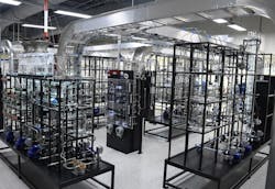 Figure 1: The 32-ft, propylene glycol distillation and recycling unit at LyondellBasell’s Center for Petrochemical Energy & Technology (CPET) at San Jacinto College in Pasadena, Texas, includes an eight tray column, DeltaV DCS, cooling water, boiler and reverse osmosis utilities, and 72 I/O with smart Rosemount transmitters. CPET’s glass pilot plant has two tank farms, feeding four process units, and all-glass and -acrylic components for easier observation. Figure 1: The 32-ft, propylene glycol distillation and recycling unit at LyondellBasell’s Center for Petrochemical Energy & Technology (CPET) at San Jacinto College in Pasadena, Texas, includes an eight tray column, DeltaV DCS, cooling water, boiler and reverse osmosis utilities, and 72 I/O with smart Rosemount transmitters. CPET’s glass pilot plant has two tank farms, feeding four process units, and all-glass and -acrylic components for easier observation.