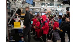 Figure 1: Steady streams of students and other visitors take in the digital and cybersecurity demonstrations at Manufacturing times Digital (MxD) institute, which provides participants with programs in digitalized tools, cybersecurity and workforce expertise. Figure 1: Steady streams of students and other visitors take in the digital and cybersecurity demonstrations at Manufacturing times Digital (MxD) institute, which provides participants with programs in digitalized tools, cybersecurity and workforce expertise.