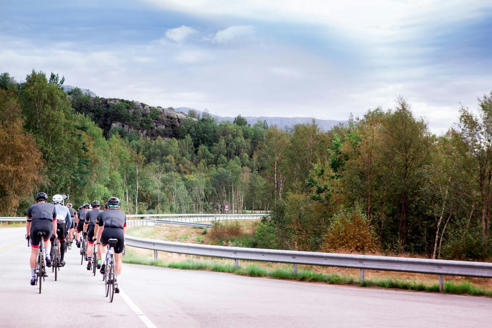 group of cyclists in the mountains