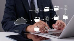 Professional managing digital documents and data flow on laptop, symbolizing cloud computing, organized file management, and efficient digital transformation for business. Professional managing digital documents and data flow on laptop, symbolizing cloud computing, organized file management, and efficient digital transformation for business.