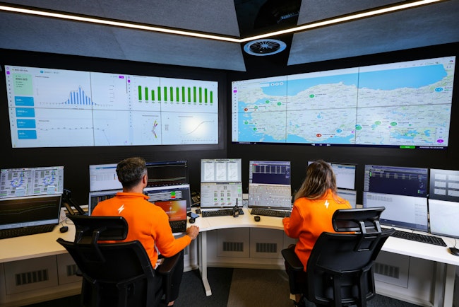 Engineers at Senkron Digital looking at charts on a screen