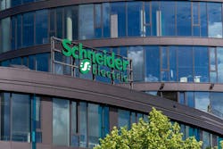 Schneider Electric automation and energy management company logo on headquarters in Prague Schneider Electric automation and energy management company logo on headquarters in Prague