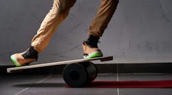 oval wooden deck for balance board. solid plastic roller for balance board. Rocker-roller boards. Isolated oval wooden deck for balance board. solid plastic roller for balance board. Rocker-roller boards. Isolated