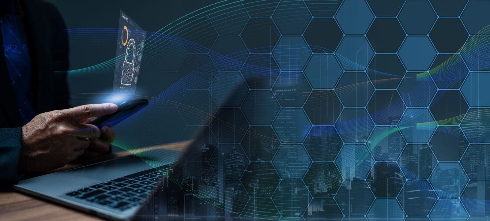 OT cybersecurity concept on gridded background with a laptop