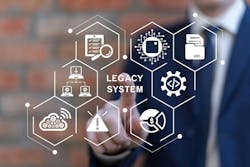 Man using virtual touch screen presses inscription: LEGACY SYSTEMS. Man using virtual touch screen presses inscription: LEGACY SYSTEMS.