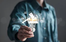 Businessman holding creative light bulb with symbol of justice and standards Businessman holding creative light bulb with symbol of justice and standards
