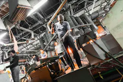 Glass factory workers on production of glass background working with manufacture equipment. Glass factory workers on production of glass background working with manufacture equipment.