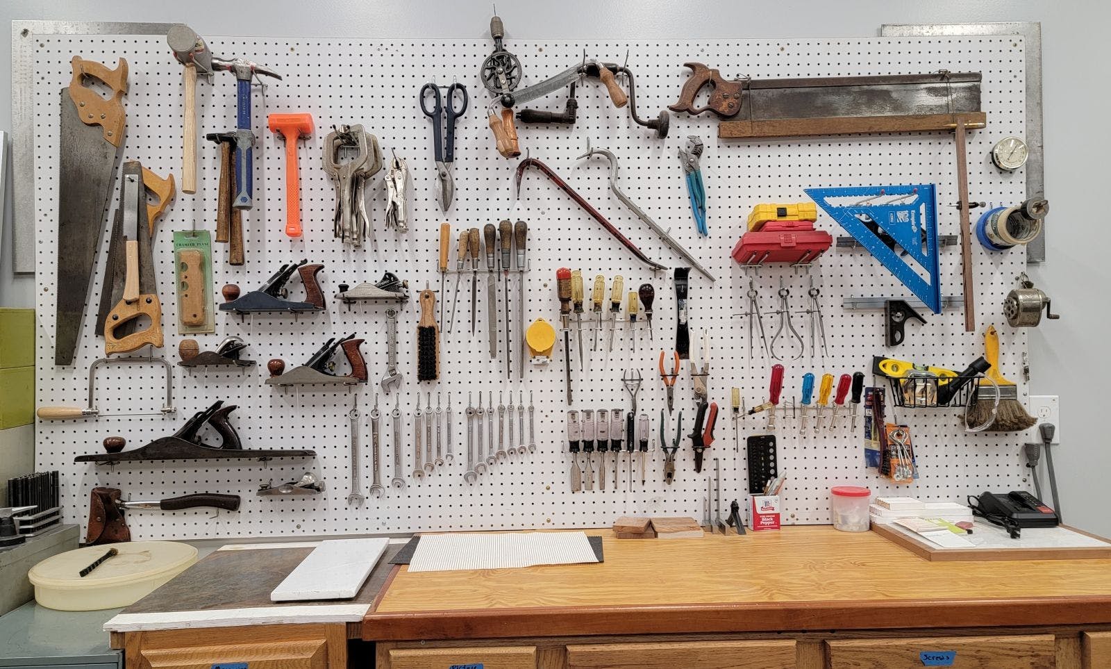 Pegboard storage wall for shop tools