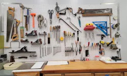 Pegboard storage wall for shop tools Pegboard storage wall for shop tools