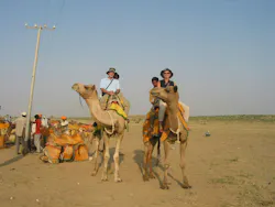 Peter Morgan riding a camel in India in 2006 Peter Morgan riding a camel in India in 2006