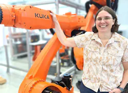 Melonee Wise, chief software and AI product officer at Kuka, standing next to a Kuka robotic arm. Melonee Wise, chief software and AI product officer at Kuka, standing next to a Kuka robotic arm.