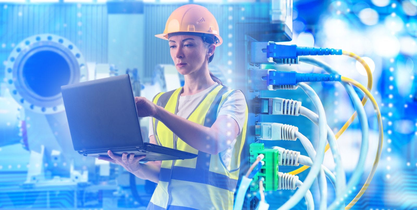 Industrial network engineer configures equipment with laptop, monitoring data connections, managing control systems, ensuring reliable automation, cybersecurity, and plant operations.