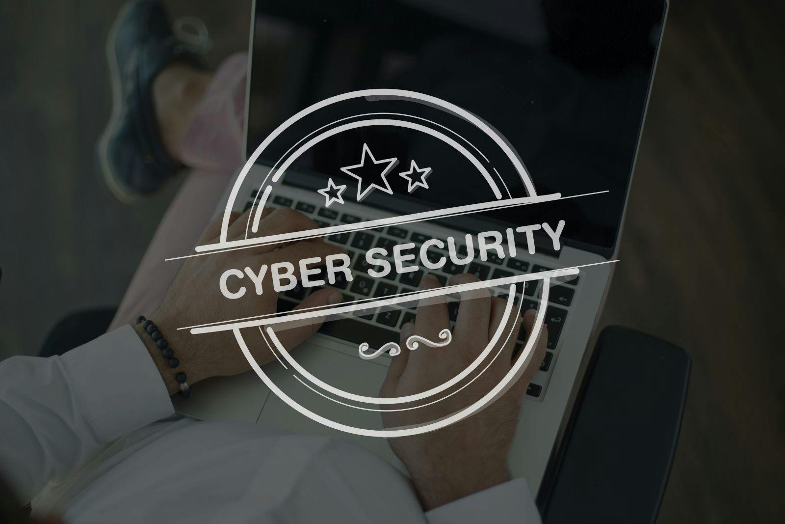 People Using Laptop and CYBERSECURITY Concept
