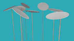 Plates being spun on thin wooden pikes against a teal background.