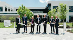 Wielding the traditional, big, shiny scissors, ribbon cutters inaugurating Endress+Hauser USA Innovation Center and new George E. Booth headquarters on June 23 include (l. to r.) Mark Myers, mayor of Greenwood, Ind., Laurent Malley, chief sales officer at Endress+Hauser, Todd Lucey, managing director at Endress+Hauser USA, Peter Selders, CEO at Endress+Hauser, Steven Endress, president of Endress+Hauser’s Supervisory Board, George E. Booth II, and Scott Young, president of George E. Booth.