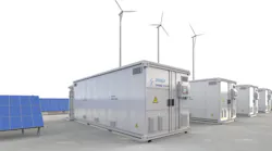 A line of energy storage units next to blue solar panels with three windmills in the background.