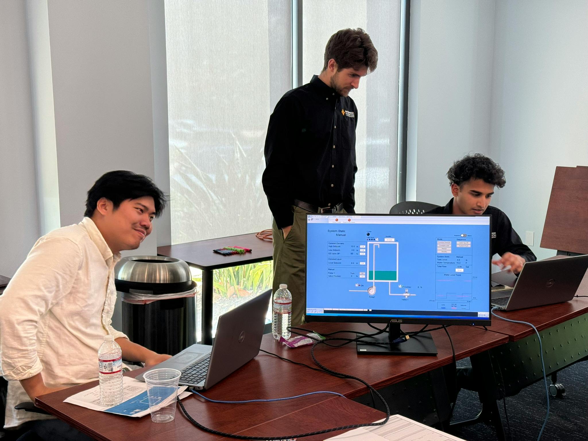 Figure 2: After developing HMI/SCADA screens for their process application, they&rsquo;re tested by (l. to r.) Cain Chen, controls engineer I, Atticus Binder, controls engineer I, and Joseph Pallan, controls engineer II, as part of their EA University program.